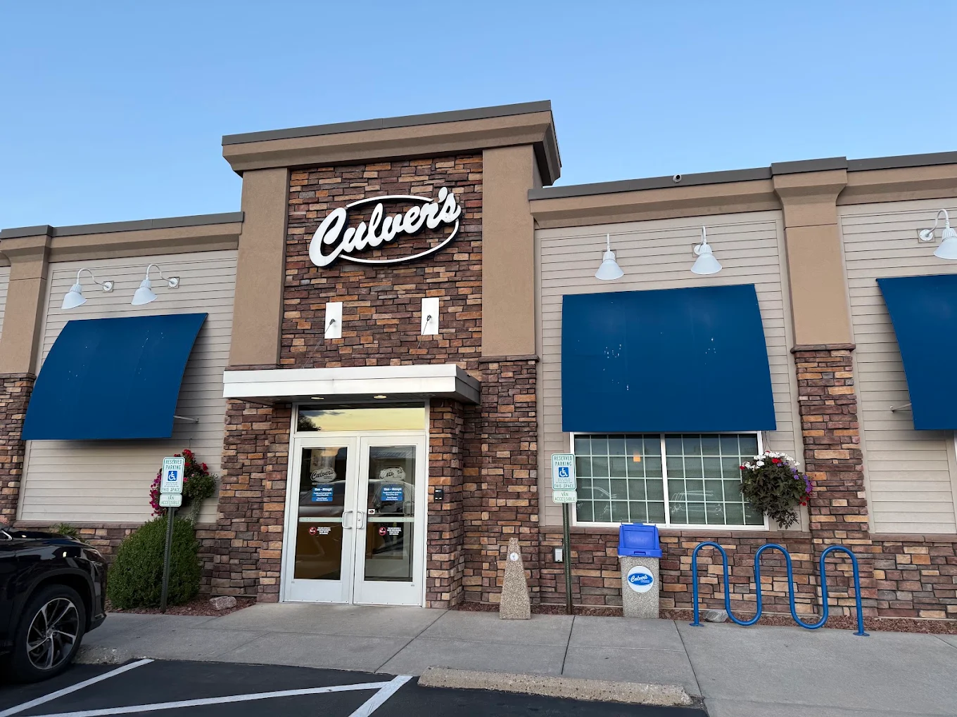 Exterior of a Culver's restaurant with signature blue awnings and front entrance, a popular dining option near Valley Springs Farm Bed & Breakfast.